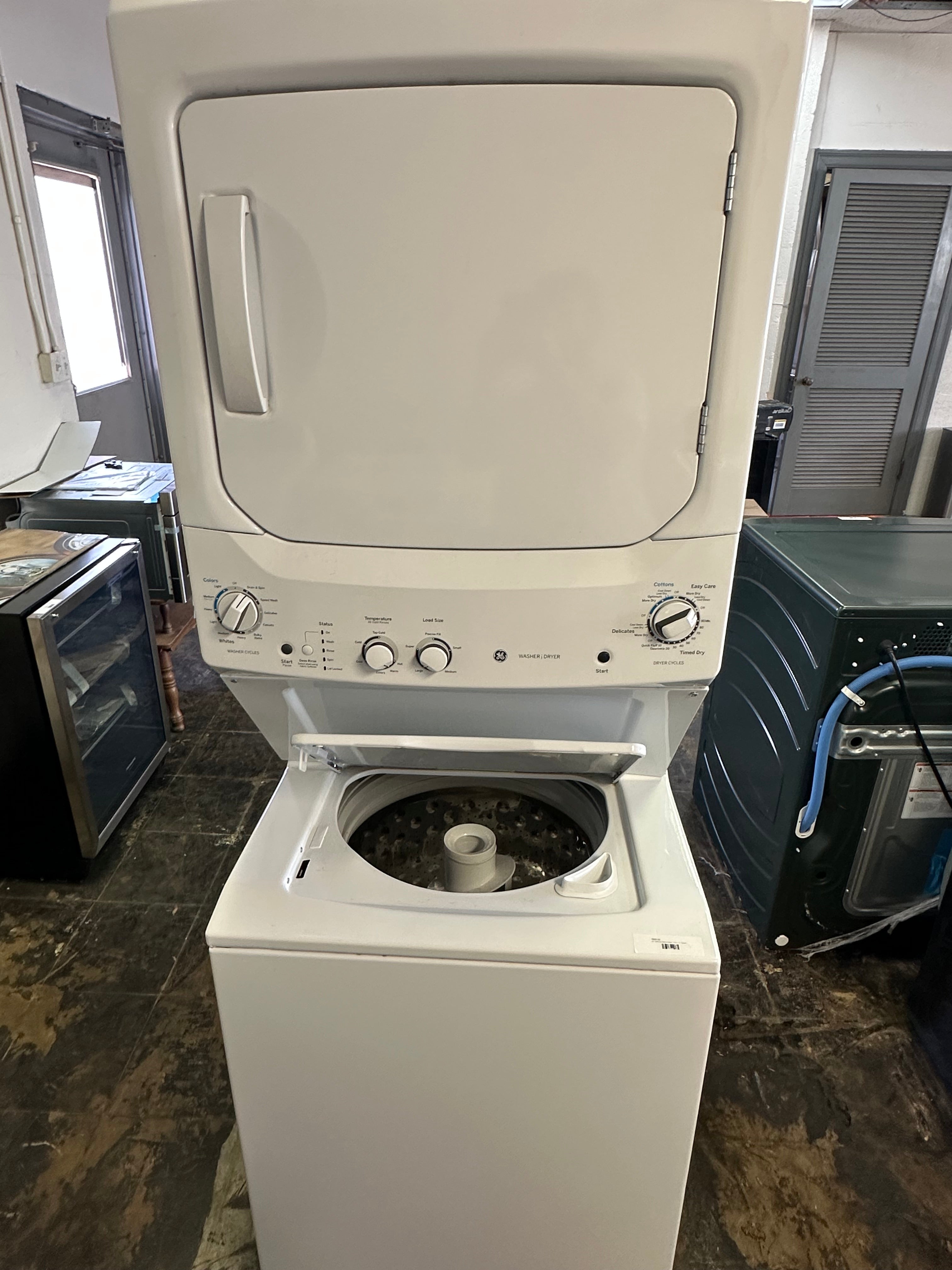 GE Unitized Spacemaker® 3.8 cu. ft. Capacity Washer with Stainless Steel Basket and 5.9 cu. ft.  Model #:GUD27GSSMWW