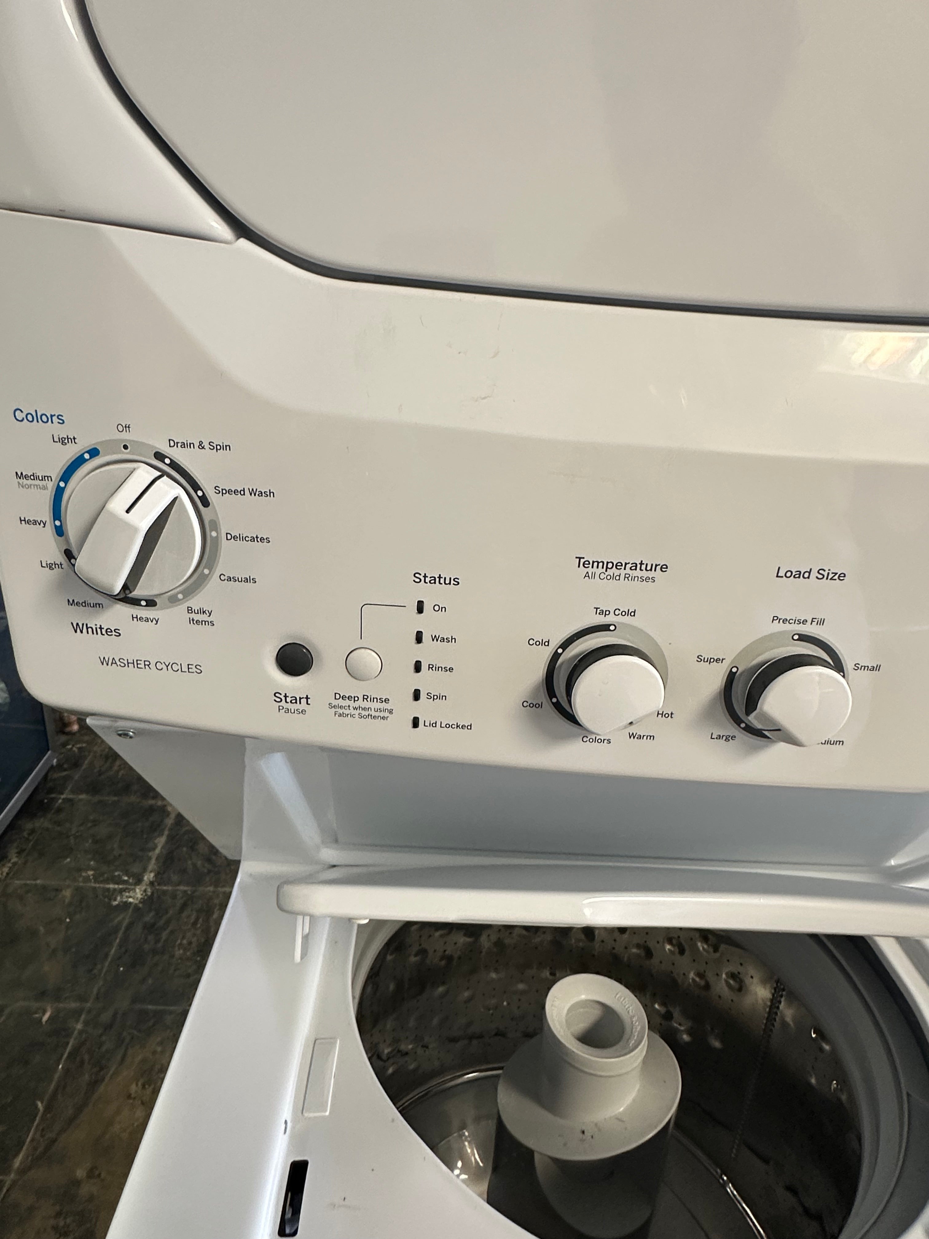 GE Unitized Spacemaker® 3.8 cu. ft. Capacity Washer with Stainless Steel Basket and 5.9 cu. ft.  Model #:GUD27GSSMWW