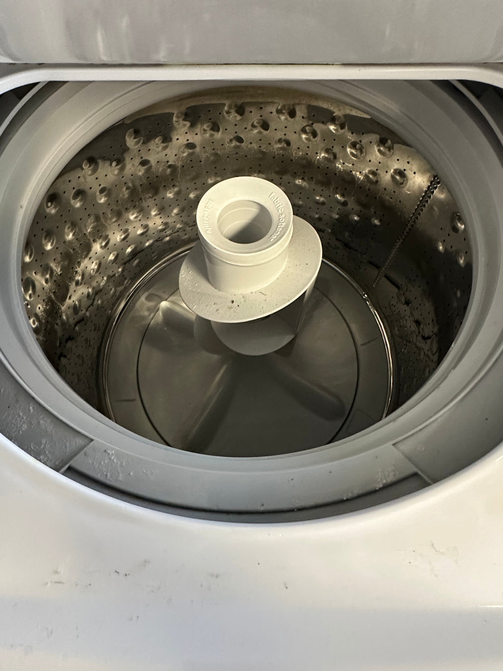 GE Unitized Spacemaker® 3.8 cu. ft. Capacity Washer with Stainless Steel Basket and 5.9 cu. ft.  Model #:GUD27GSSMWW