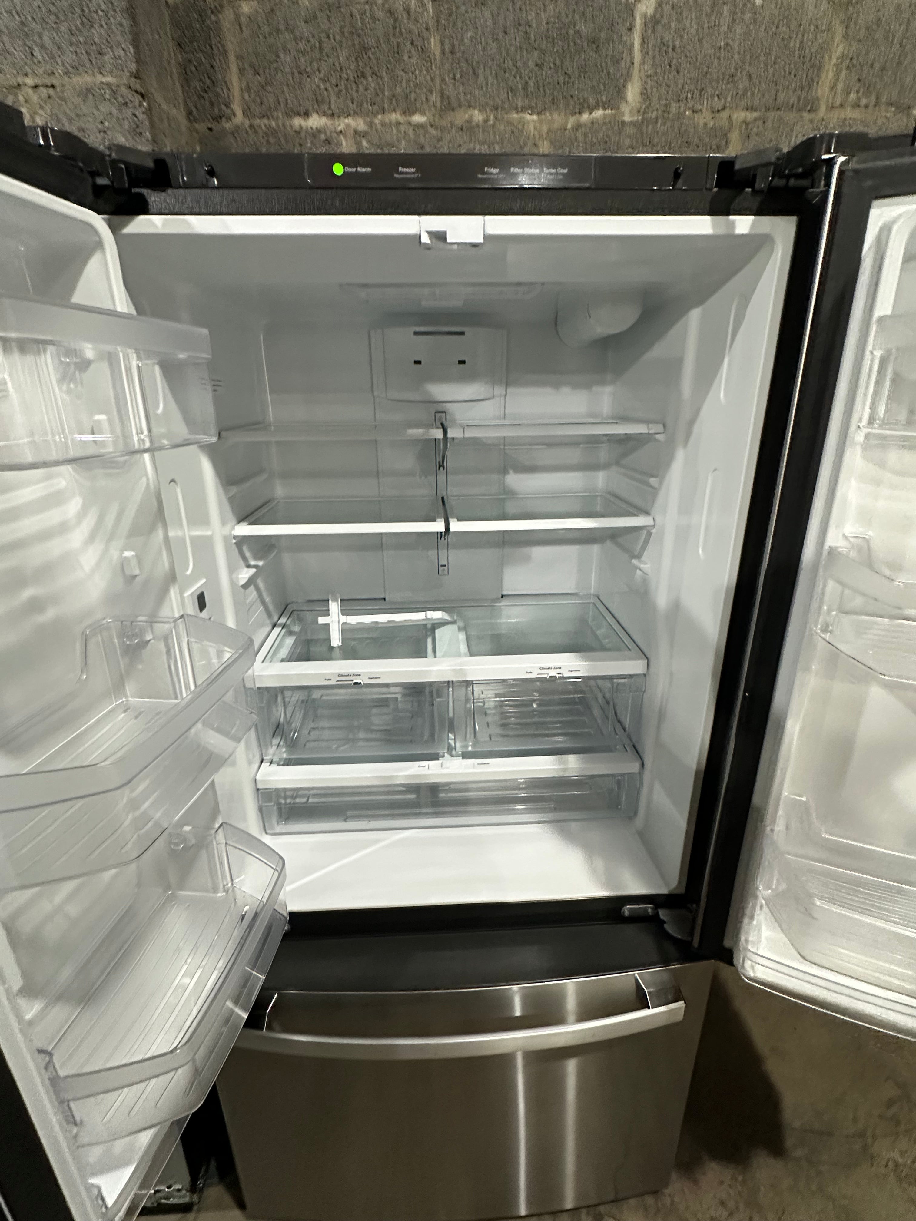 GE Standard-Depth 24.8-cu ft 3 -Door French Door Refrigerator with Ice Maker with Water Dispenser ( Fingerprint-resistant Stainless Steel ) ENERGY STAR Certified