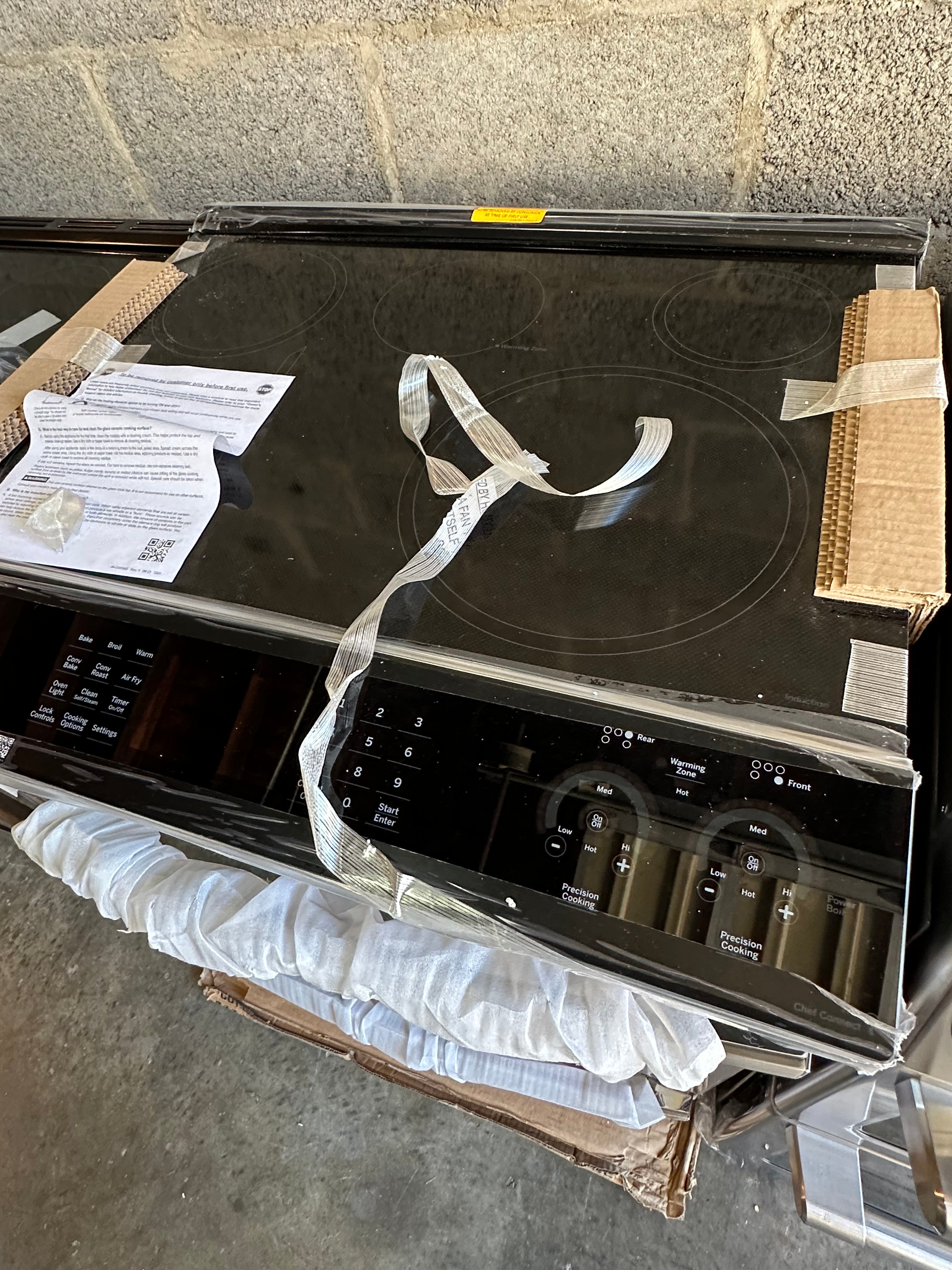 GE Profile™ 30" Smart Slide-In Fingerprint Resistant Front-Control Induction and Convection Range with No Preheat Air Fry  Model #: PHS930YPFS