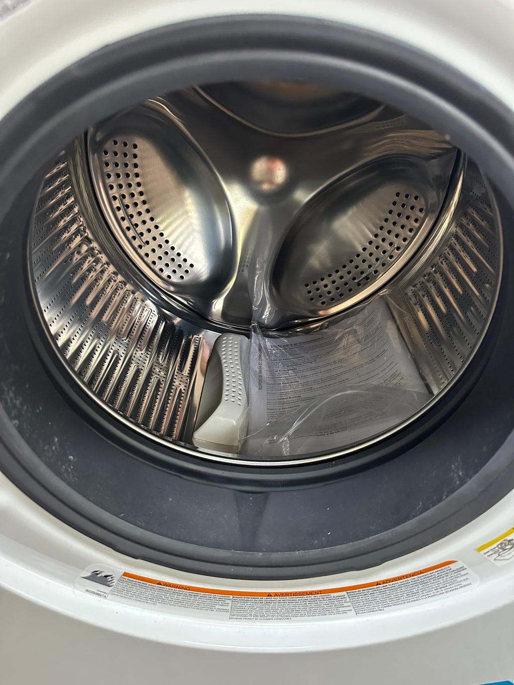 GE® 24" 2.4 cu. ft.Capacity Front Load Washer/Condenser Dryer Combo Model #: GFQ14ESSNWW